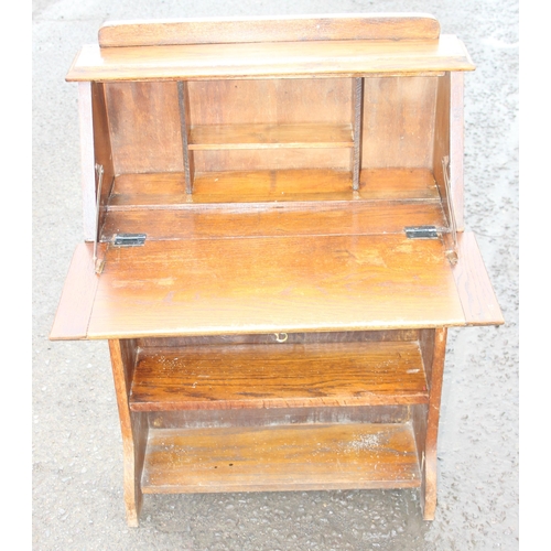 155 - An early 20th century oak student's bureau, approx 66cm wide x 24cm deep x 98cm tall