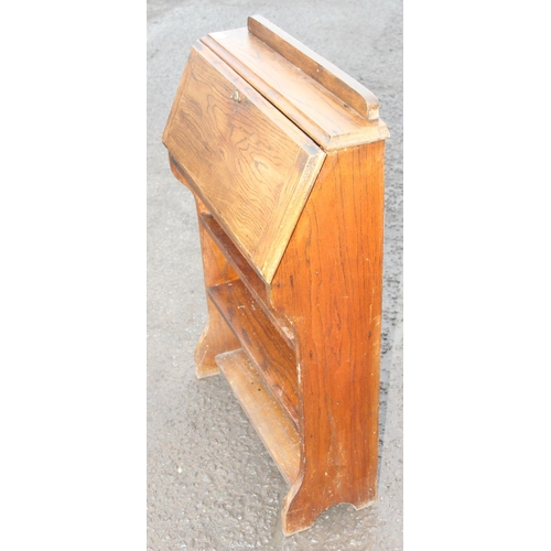 155 - An early 20th century oak student's bureau, approx 66cm wide x 24cm deep x 98cm tall