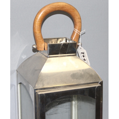 1742 - Large tall wooden handled metal and glass framed garden lantern, a second smaller one and a battery ... 