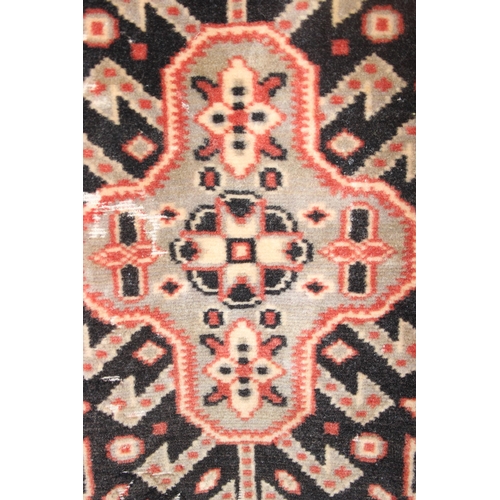 204 - 2 small runner rugs of red coloured ground, largest approx 139 x 37cm