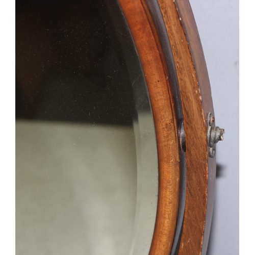 284 - A 19th century mahogany framed oval shaped table top mirror on stand, approx 56cm tall x 45cm wide