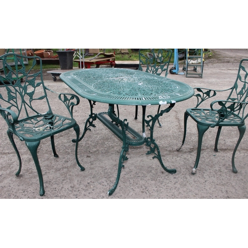 309 - A Victorian style green painted aluminium garden table and chairs, the table approx 138cm W x 80cm D... 