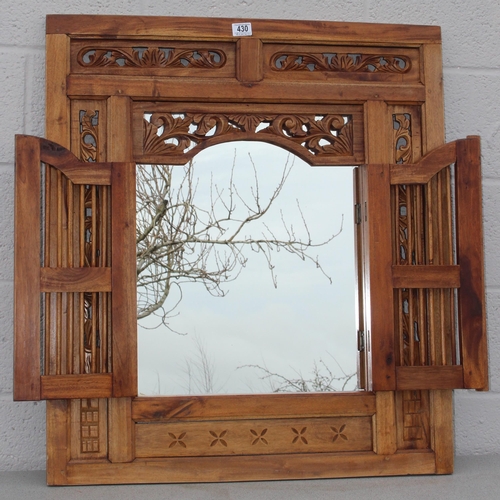 430 - A vintage carved wooden shutter wall mirror, approx 80cm x 90cm,