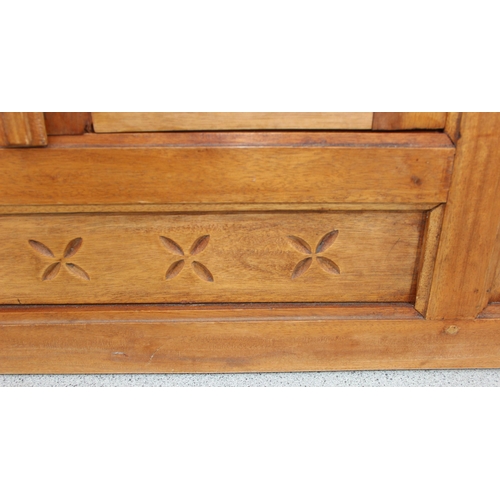 430 - A vintage carved wooden shutter wall mirror, approx 80cm x 90cm,