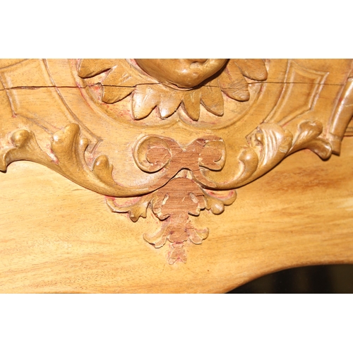 435 - Large Victorian satinwood wall hanging mirror with well carved cherub head pediment, approx 85cm x 7... 