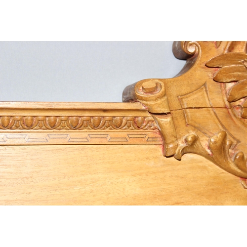 435 - Large Victorian satinwood wall hanging mirror with well carved cherub head pediment, approx 85cm x 7... 