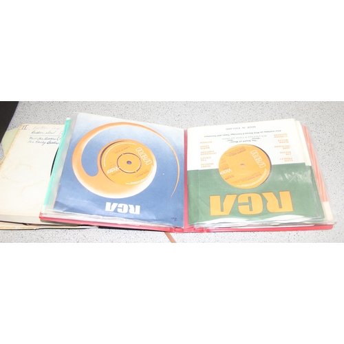 514 - Qty of music ephemera and other items, to incl folder of vinyl single records (The Bachelors, Elvis ... 