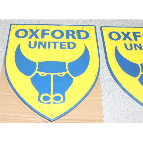 707 - 2 x Oxford United cast metal shield shaped wall plaques, approx 26cm x 30cm