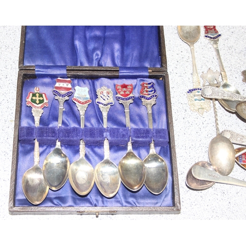 1052 - Qty of assorted silver plated collectors spoons, some with enamel decoration