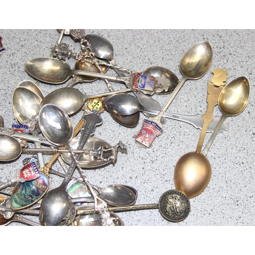 1052 - Qty of assorted silver plated collectors spoons, some with enamel decoration