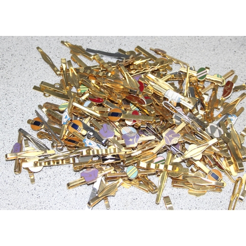 1111 - Qty of vintage gold-plated tie clips, some with enamelled details, approx 2kg gross