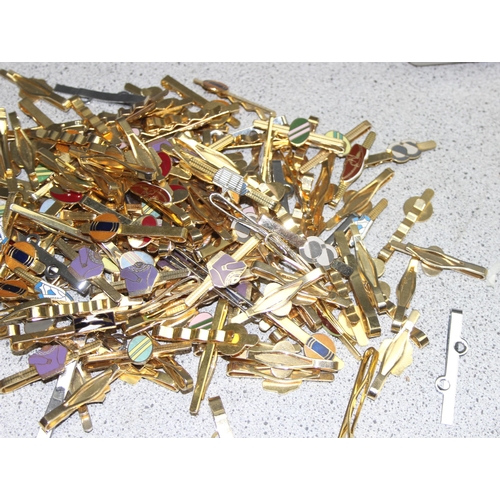 1111 - Qty of vintage gold-plated tie clips, some with enamelled details, approx 2kg gross