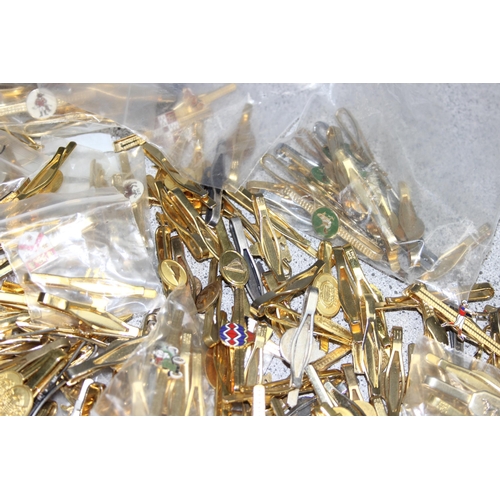 1112 - Qty of vintage tie clips, mostly gold-plated, many with sporting enamelled details, approx 2kg gross