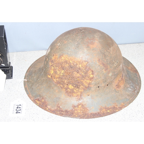 1434 - WW2 Zuckerman helmet and a military photographic film cassette Cat. No. 6730-99-914-4797, serial num... 