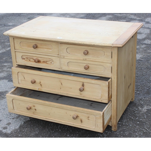 160 - A vintage pine chest of drawers, 2 short drawers to the left next to 2 faux short drawers forming a ... 