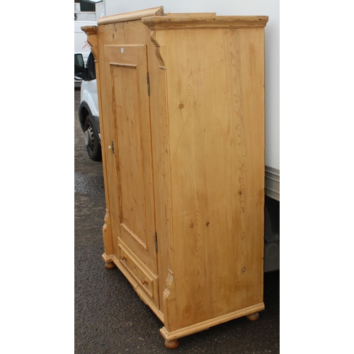 161 - A Victorian pine wardrobe with single drawer to base, approx 124cm wide x 67cm deep x 186cm tall