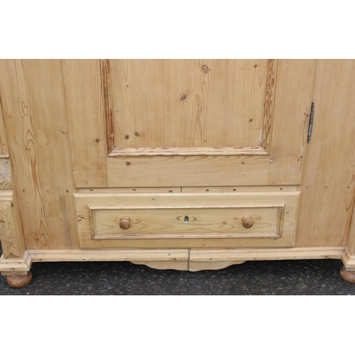 161 - A Victorian pine wardrobe with single drawer to base, approx 124cm wide x 67cm deep x 186cm tall