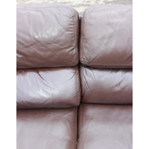 165 - A good quality modern dark brown leather 2 seater sofa, one of 2 matching in the sale with labels fo... 