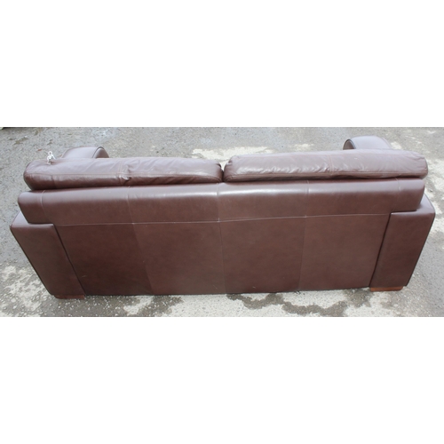 166 - A good quality modern dark brown leather 2 seater sofa, one of 2 matching in the sale with labels fo... 