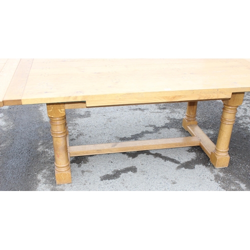 168 - An impressive modern light oak extending dining or refectory table, approx 183cm (extending to 275cm... 