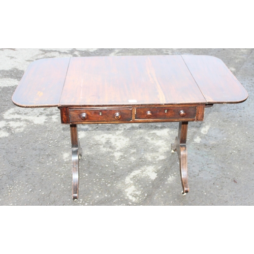 170 - An antique mahogany sofa table with 2 drawers, 2 drop leaves and ceramic castors, approx 74cm (123cm... 