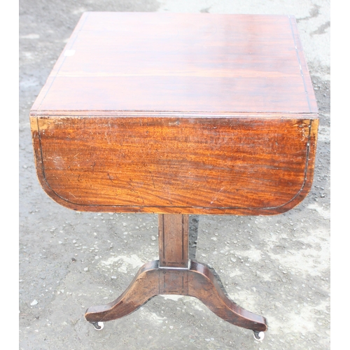 170 - An antique mahogany sofa table with 2 drawers, 2 drop leaves and ceramic castors, approx 74cm (123cm... 