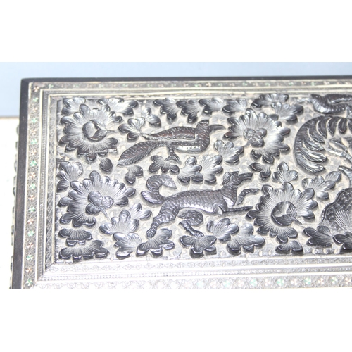 287 - Carved Indian box with inlaid details, depicting dogs and birds, approx 29 x 12 x 6cm