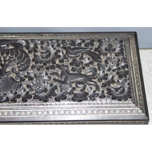 287 - Carved Indian box with inlaid details, depicting dogs and birds, approx 29 x 12 x 6cm