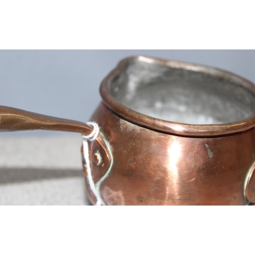 1602 - An Arts & Crafts period copper warming pan with handle and a similar round bowl, possibly a milk and... 