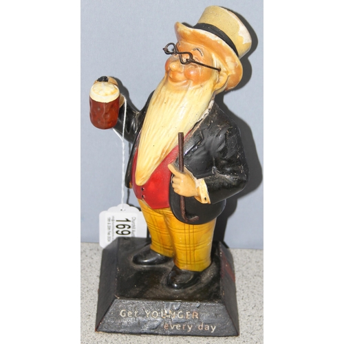 1690 - William Youngers 'Get Younger Every Day' ale advertising ceramic figurine, approx 23cm tall