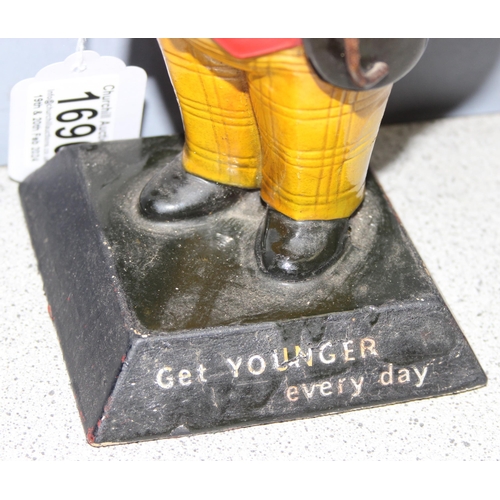 1690 - William Youngers 'Get Younger Every Day' ale advertising ceramic figurine, approx 23cm tall