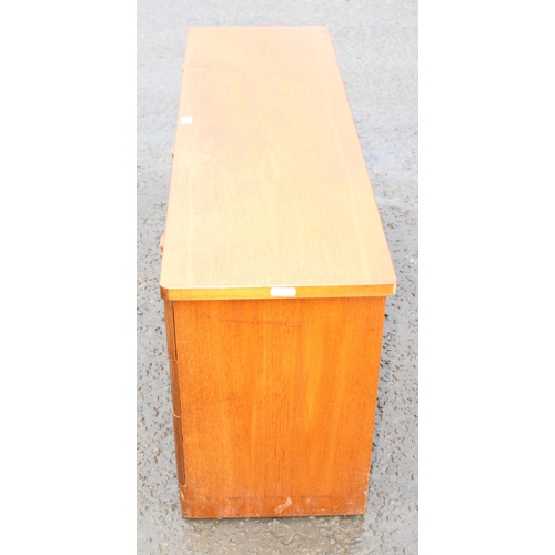 179 - A retro Stag teak 6 drawer chest of drawers or sideboard, approx 138cm wide x 44cm deep x 64cm tall