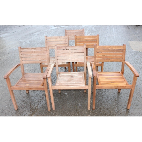 320 - A slatted wooden garden table and 6 chairs, the table approx 140cm (extending to 280cm) wide x 77cm ... 