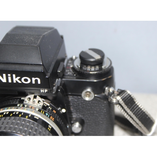 667 - A rare Nikon F3 camera with a Nikkor 24mm 1:2.8 lens