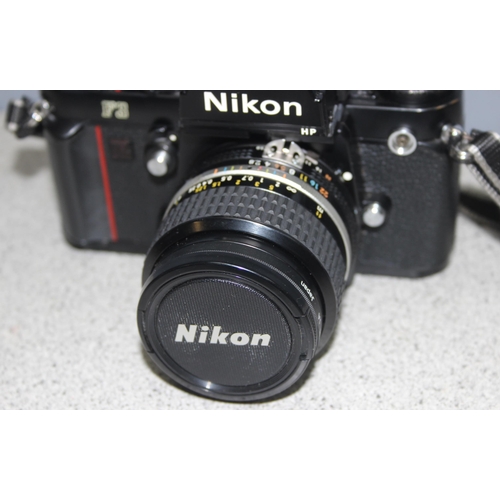 667 - A rare Nikon F3 camera with a Nikkor 24mm 1:2.8 lens