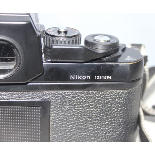 667 - A rare Nikon F3 camera with a Nikkor 24mm 1:2.8 lens