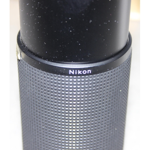 668 - Nikon Nikkor 100-300mm f/5.6 lens in original box