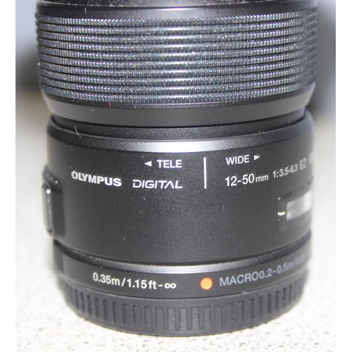 679 - Olympus M.Zuiko Digital 12-50mm 1 f/3.5-6.3 Lens with lens hood in Matin case