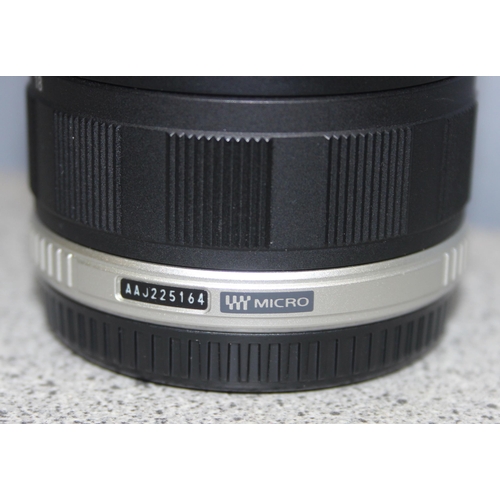 680 - Olympus 9-18mm f 1:4.0-5.6 M.Zuiko Digital ED Micro camera lens in Panasonic case