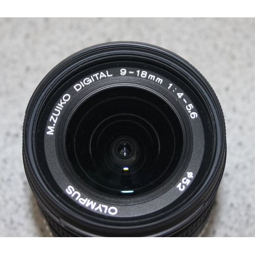 680 - Olympus 9-18mm f 1:4.0-5.6 M.Zuiko Digital ED Micro camera lens in Panasonic case