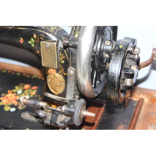 812 - German made hand-crank sewing machine, Serial No: 667231 by Max Carl Gritzner in wooden case