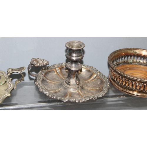 1087 - Assorted antique and later silver-plated items, mostly wine coasters chambersticks