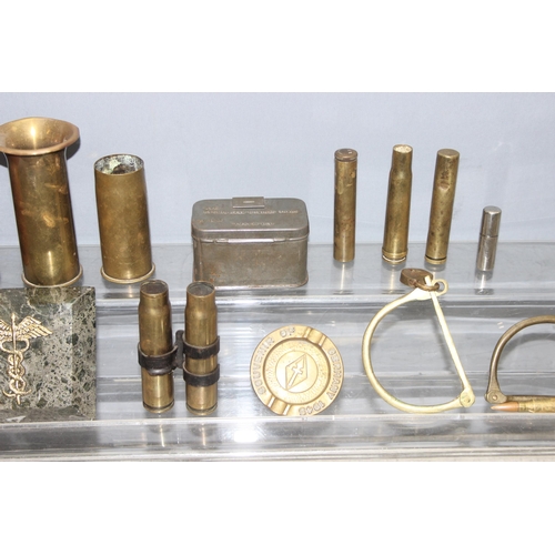 1451 - Mixed lot of militaria items to incl mess tin, brass trench art, button sticks, wooden money box etc