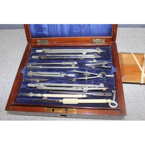 1453 - Air Ministry technical drawing kit in mahogany case, with 2 WW2 period Air Ministry Captain Fields p... 