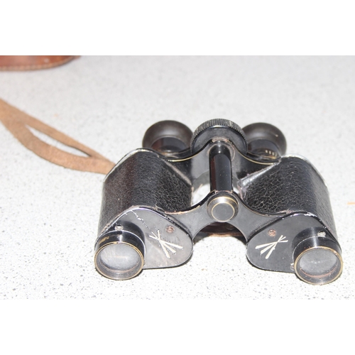 1464 - Pair of early 20th century French made private purchase x7 binoculars in leather case