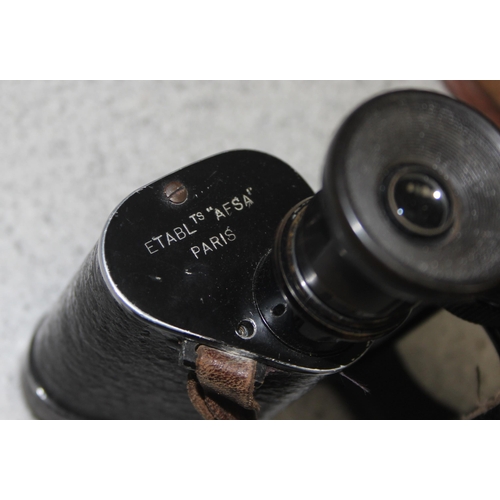 1464 - Pair of early 20th century French made private purchase x7 binoculars in leather case