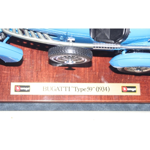 1535 - Burago model of a 1934 Bugatti 'Type 59' in blue, with display case, width of case approx 30cm