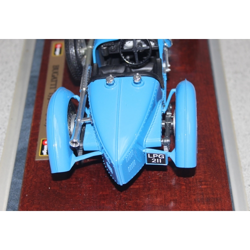 1535 - Burago model of a 1934 Bugatti 'Type 59' in blue, with display case, width of case approx 30cm