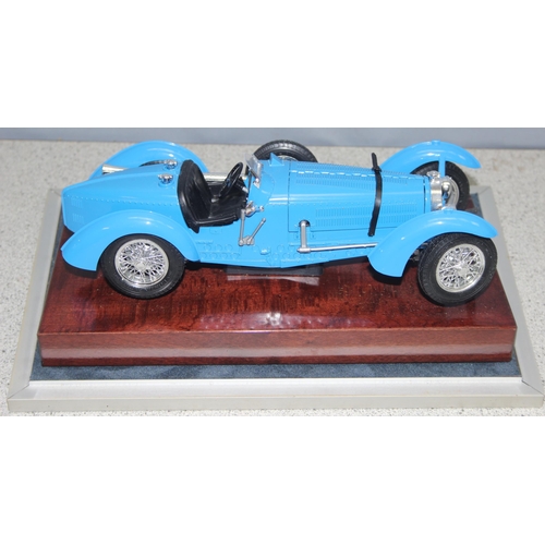 1535 - Burago model of a 1934 Bugatti 'Type 59' in blue, with display case, width of case approx 30cm