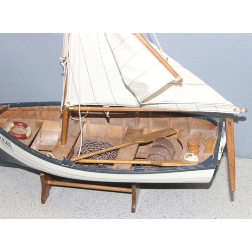 1540 - Wooden model boat with sails, approx 40cm long